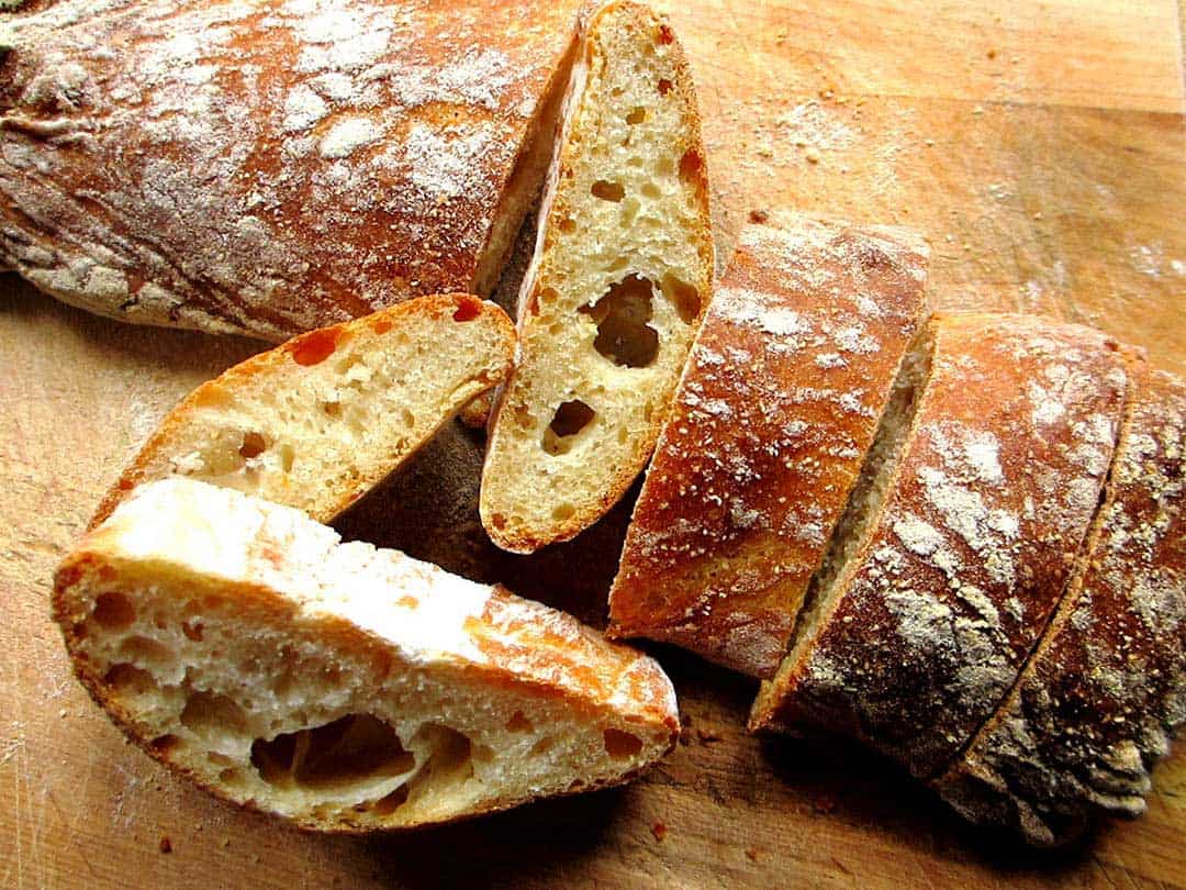 A sliced loaf of Italian ciabatta